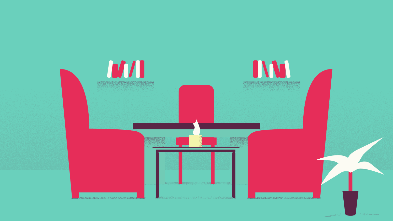 Deux fauteuils rouges autour d'une table basse